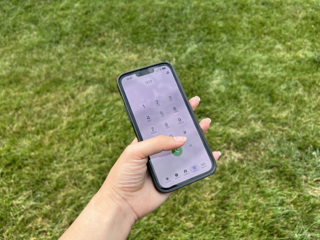 A person dials 911 on a smartphone. Next Generation 911 technology allows callers to send text messages, photos, videos and other digital information directly to emergency dispatchers. (Photo by Amanda Watford/Stateline)