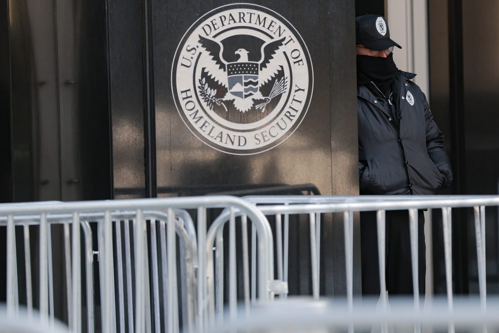 Security stands outside Immigration and Customs Enforcement headquarters during a Congressional Hispanic Caucus rally on Feb. 3, 2026 in Washington, D.C. (Photo by Heather Diehl/Getty Images)