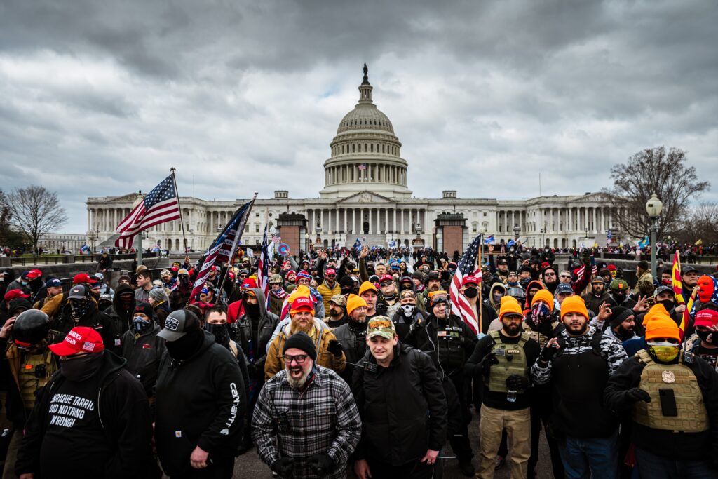 Supporters of President Donald Trump gather outside the U.S. Capitol on Jan. 6, 2021, in Washington, before a mob breached the building during the certification of the 2020 presidential election results. Critics of a proposed settlement tied to Trump’s lawsuit against the IRS have raised concerns that a planned “Anti-Weaponization” fund could ultimately benefit Jan. 6 defendants. (Photo by Jon Cherry/Getty Images)