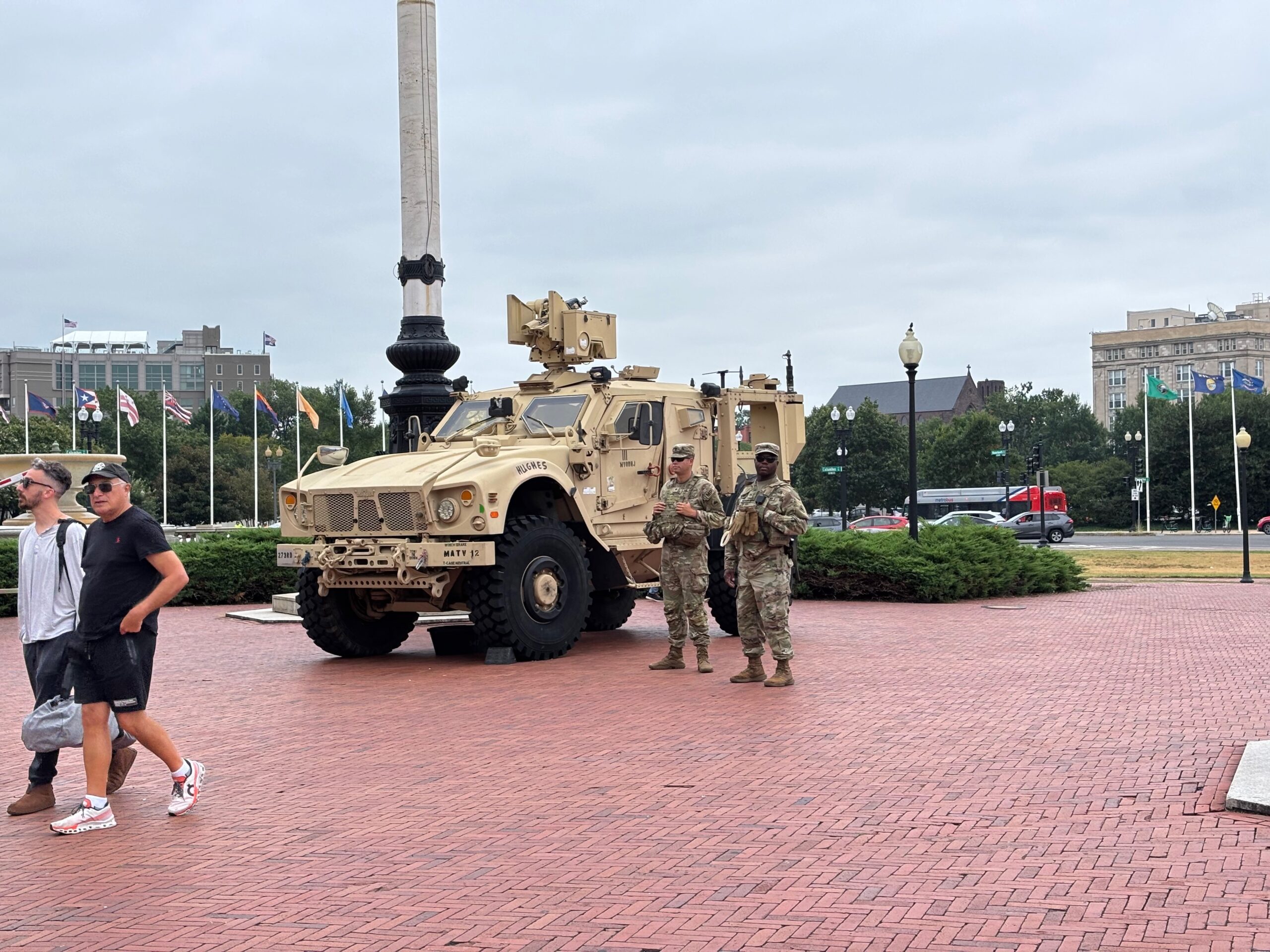 A federal judge on June 5, 2026, struck down several Trump administration policies that halted processing for asylum-seekers following a shooting in Washington, D.C. of two members of the National Guard deployed to the nation's capital. In this photo, tourists pass by members of the guard stationed outside Union Station in Washington, D.C., on Aug. 18, 2025. (Photo by Jane Norman/States Newsroom)