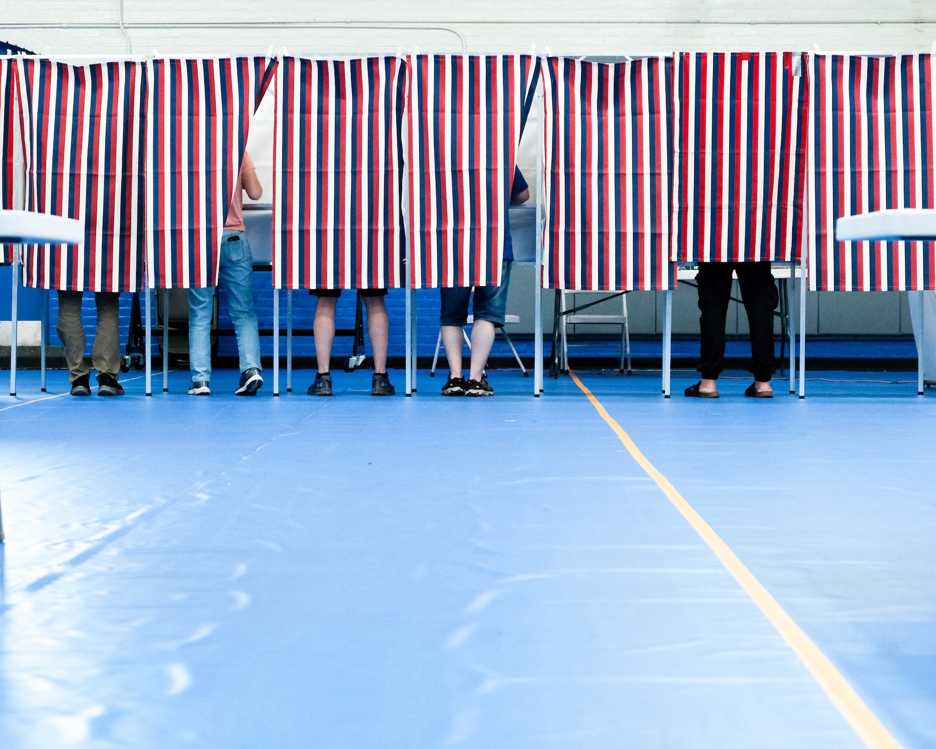 Open Democracy, a New Hampshire voting rights group, has spent several years working to improve the registration rate among 18-year-olds. Shown are New Hampshire voters. (Photo by Will Steinfeld/New Hampshire Bulletin)