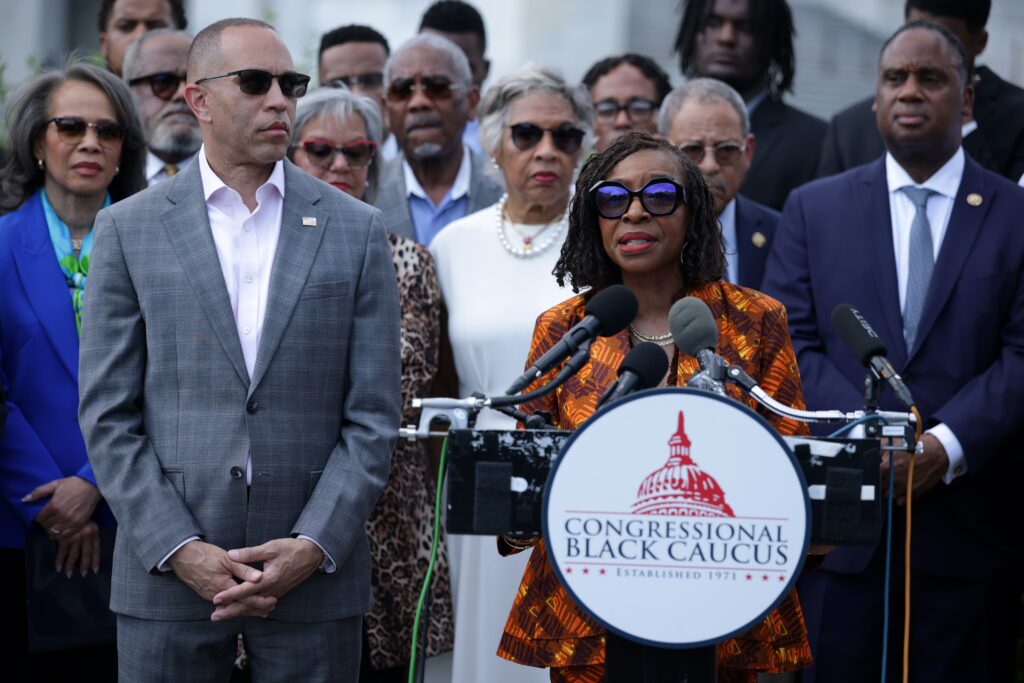 U.S. House Minority Leader Hakeem Jeffries, D-N.Y., looks on as Congressional Black Caucus Chair Yvette Clarke, D-N.Y., speaks during a news conference in front of the U.S. Capitol on May 19, 2026 in Washington, D.C. (Photo by Alex Wong/Getty Images)