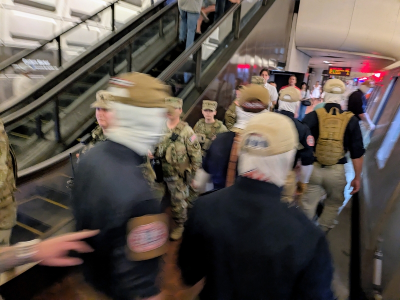 Dozens of members of the white nationalist group Patriot Front boarded the Metro at the Eastern Market station as National Guard stood by in Washington, D.C., on Saturday, July 4, 2026. (Photo by Ashley Murray/States Newsroom)